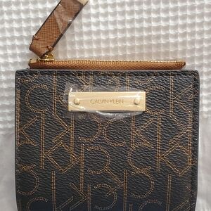 Calvin Klein Black and Gold Monogram Wallet